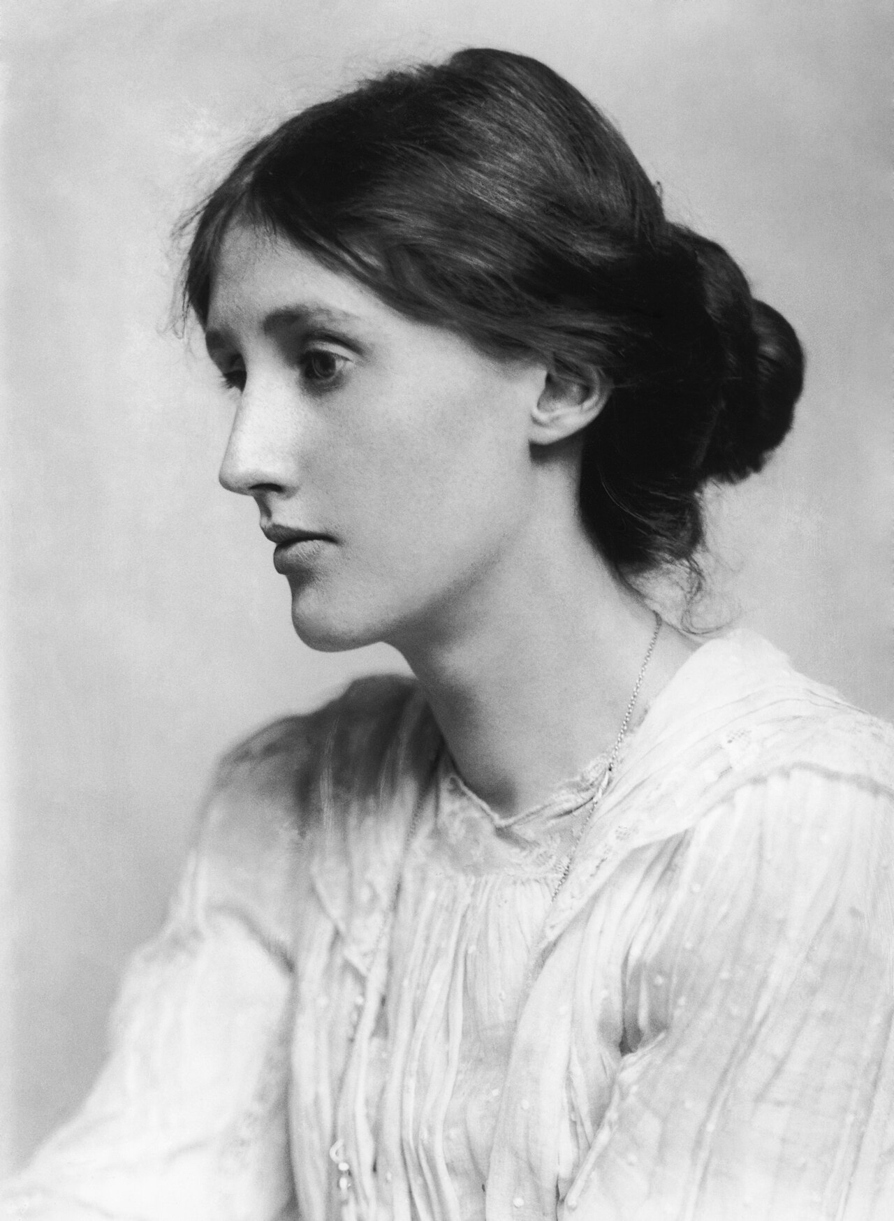 Photographic portrait of a young Virginia Woolf in profile, her hair gathered in a chignon, 1902.