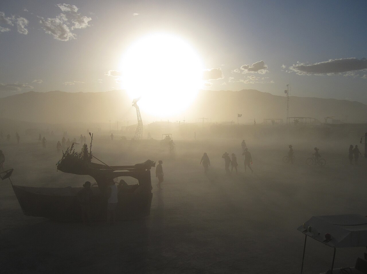A towering dust storm sweeping across the flat white alkali expanse of the Black Rock Desert in Nevada.