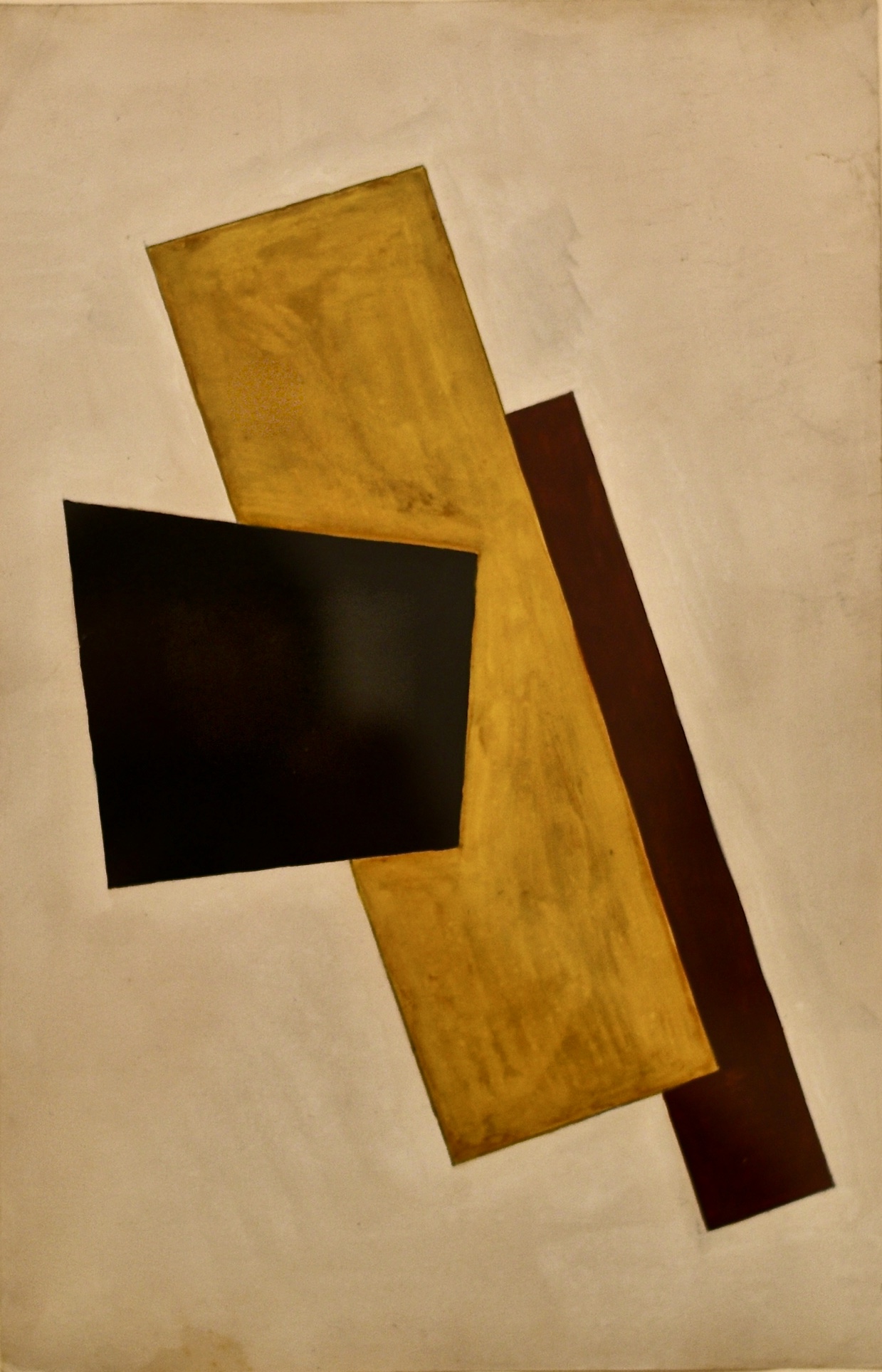 Liubov Popova's Composition (1917), gouache on paper: interlocking angular planes in gold, black and dark red set at diagonals on a cream ground.