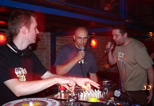 A rub-a-dub style sound system rig, Love Pulse, with stacked speaker boxes set up for a dance.