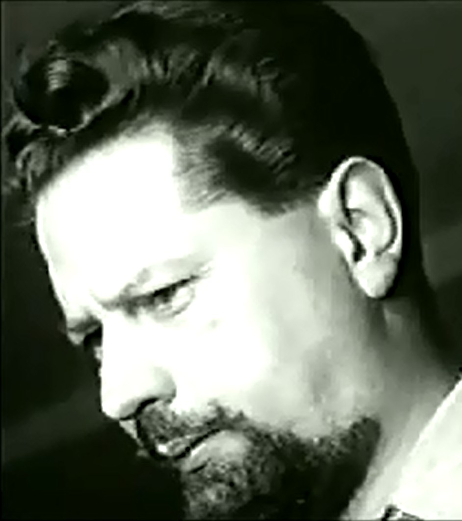 Black-and-white 1949 BBC television still of neurologist W. Grey Walter shown in close profile, brow furrowed, gaze lowered in concentration.