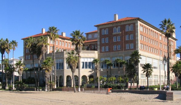 The Casa del Mar building on the beach at Santa Monica, California — a large 1926 Renaissance and Mediterranean Revival structure of pale stone facing the ocean.