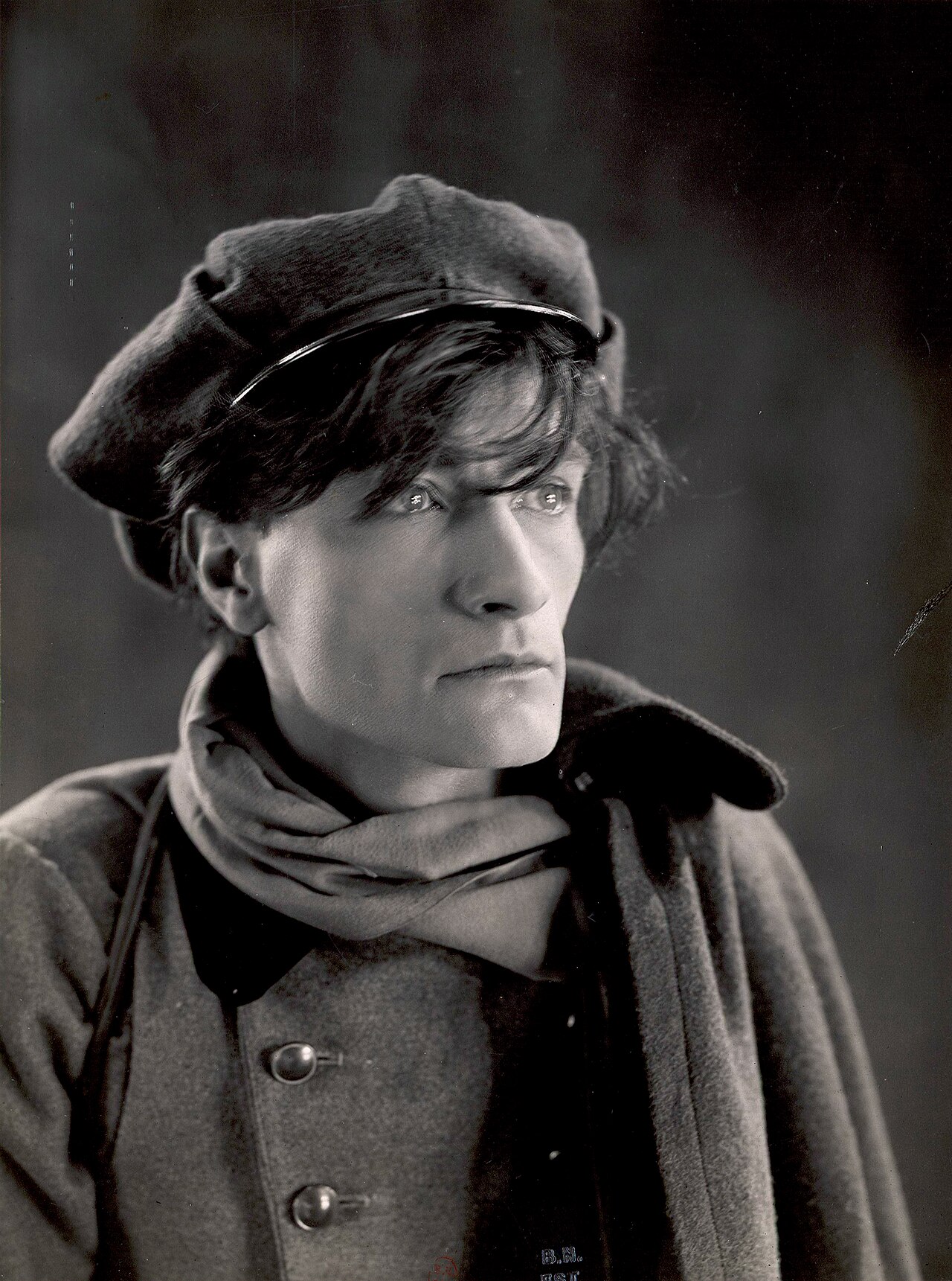 Antonin Artaud in costume as Gringalet in the 1926 film Le Juif errant, photographed in dramatic light.