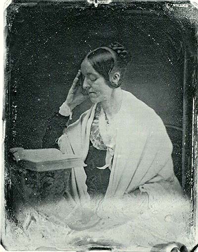 Daguerreotype portrait of Margaret Fuller, seated, reading.