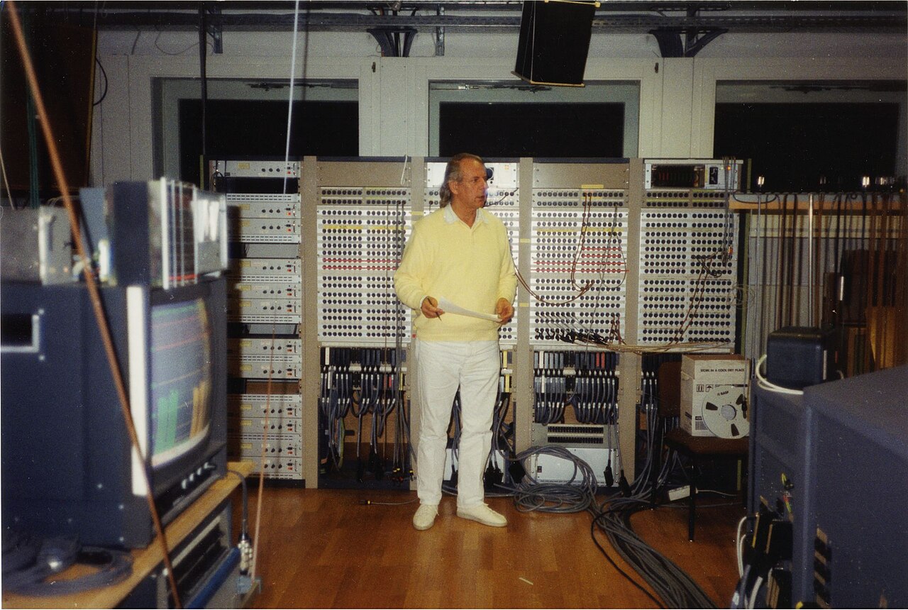 Karlheinz Stockhausen working at equipment racks in the WDR Studio, 1991.