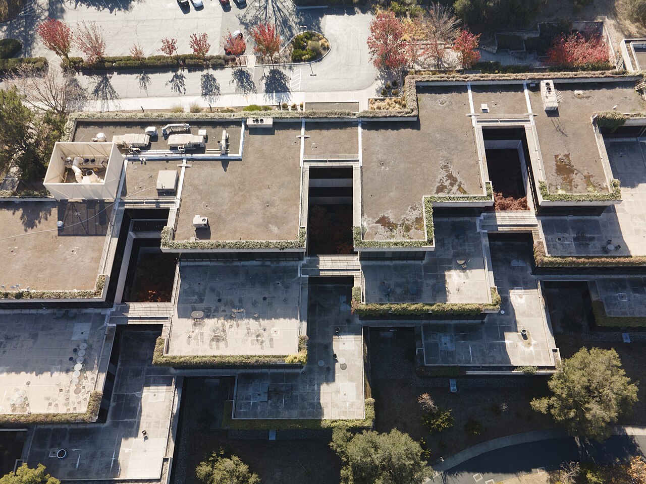 The Xerox PARC building complex photographed in 2020, its terraced concrete forms nestled into the hillside.